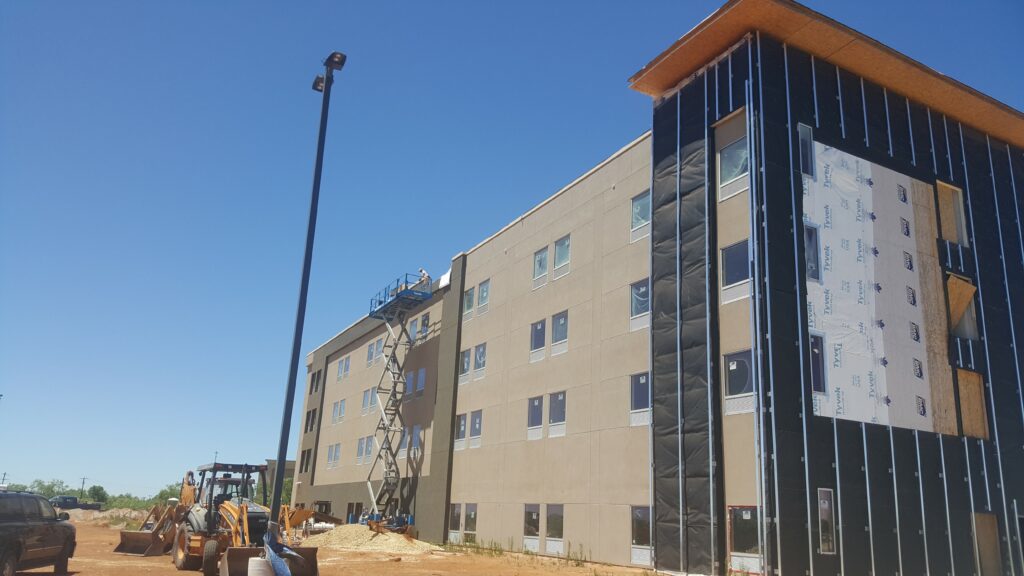 TPO roofing installation and commercial remodeling of a hotel in dallas
